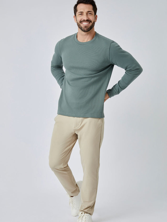 Patrick is 5'10", 163LBS and wears a size M # Mercury Green Thermal Long Sleeve Crew Full Body Studio Image | Fresh Clean Threads