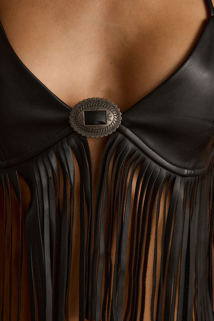 Close-up of the Mesa Black Fringe Bra Top showcasing the fringe texture and craftsmanship.