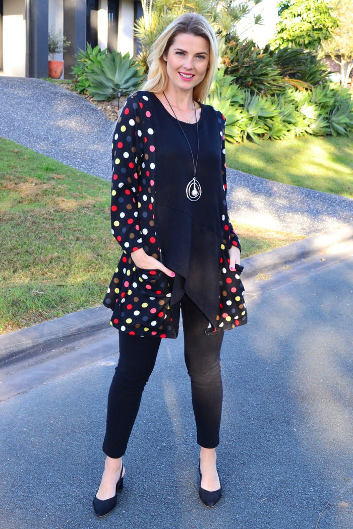 Multicolour pockets and dotted winter tunic top by Peony, featuring a cozy fabric and vibrant pattern for stylish winter wear.