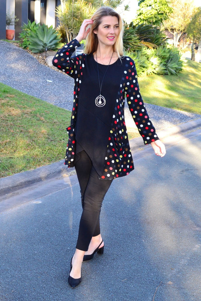 Peony multicolour pockets and dots winter tunic top with long sleeves and cozy fabric, stylish and vibrant for cold weather.