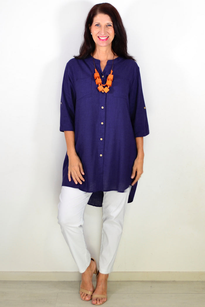 Navy block hi-low relaxed tunic shirt by Ruby Rain featuring a flowy fit and casual style, shown on a hanger.
