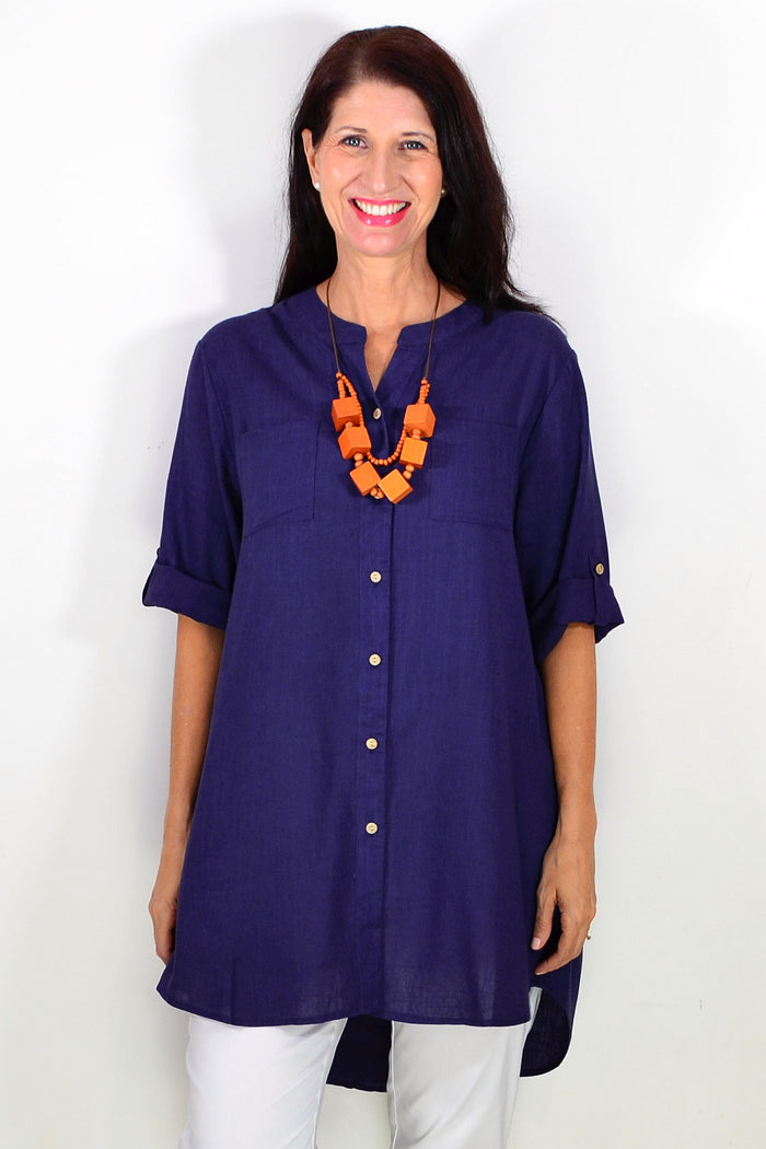 Navy block hi-low relaxed tunic shirt by Ruby Rain, featuring a casual fit and lightweight fabric, displayed on a hanger.