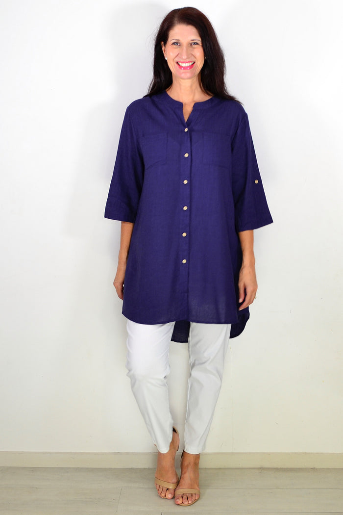 Navy block hi-low relaxed tunic shirt by Ruby Rain, displayed on a hanger with a soft fabric texture and casual fit.