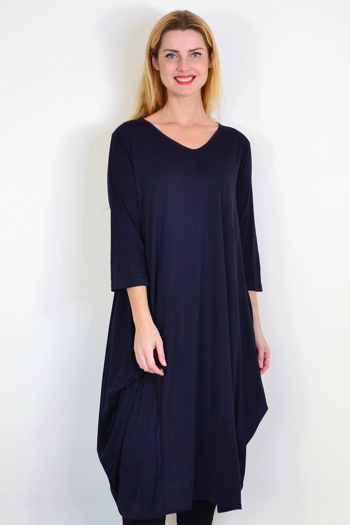 Navy blue oversized tunic dress by Lilia Whispers, relaxed fit with long sleeves and a casual, flowing silhouette.