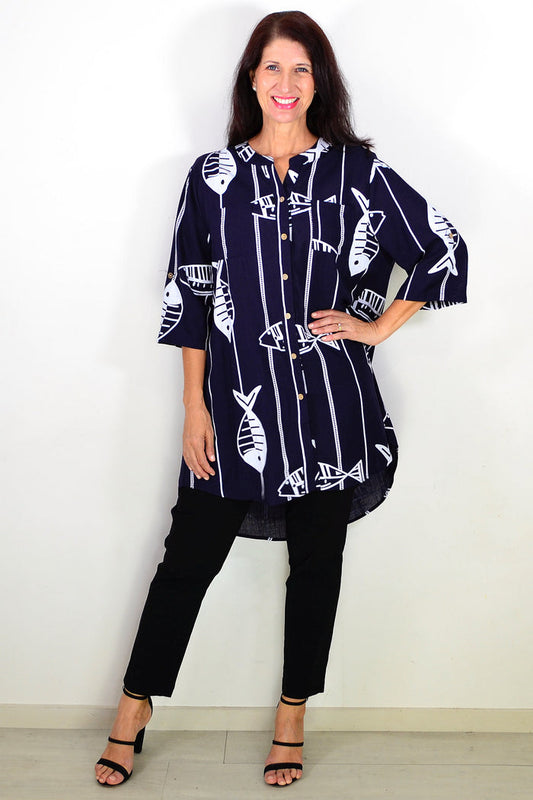 Navy hi-low relaxed tunic shirt by Ruby Rain, showcasing its flowy design and casual fit on a model.