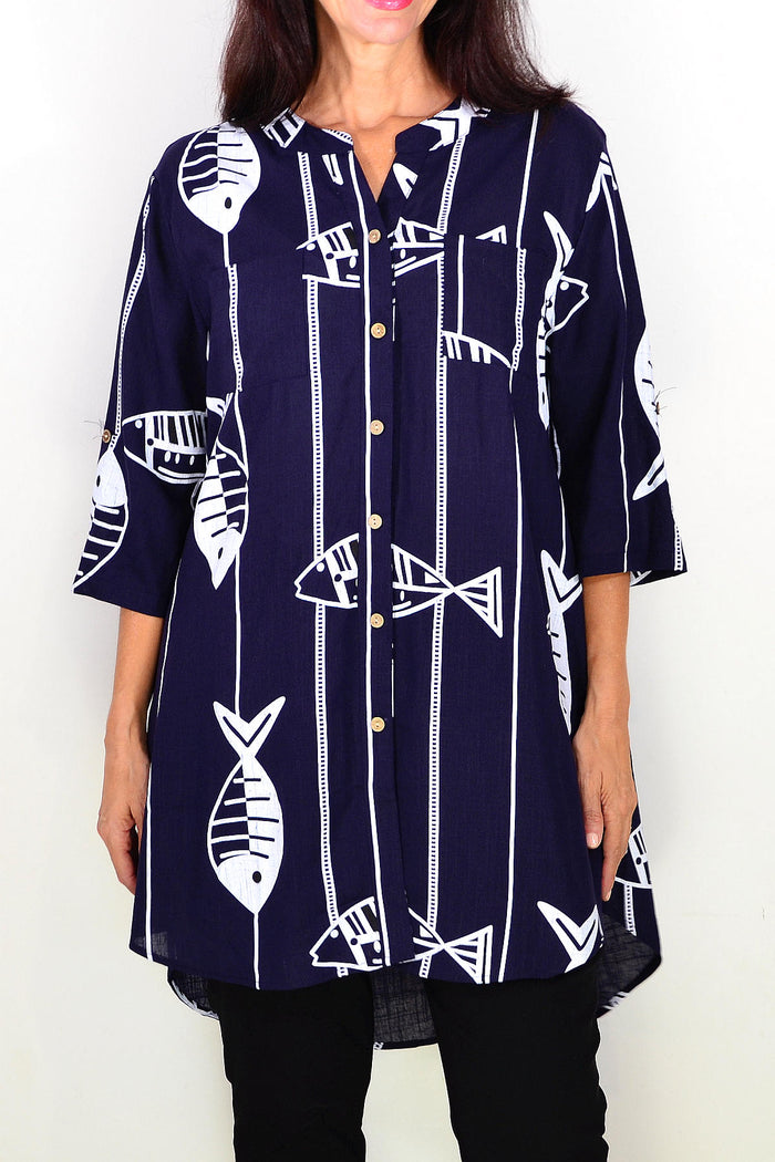 Navy hi-low relaxed tunic shirt by Ruby Rain, featuring a comfortable fit and casual style, shown on a hanger.