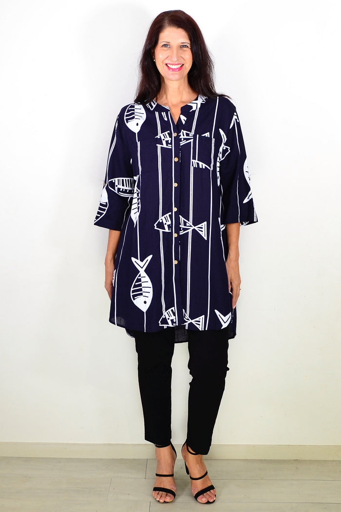 Navy hi-low relaxed tunic shirt by Ruby Rain, shown hanging with soft fabric and casual fit, front view with high-low hem.