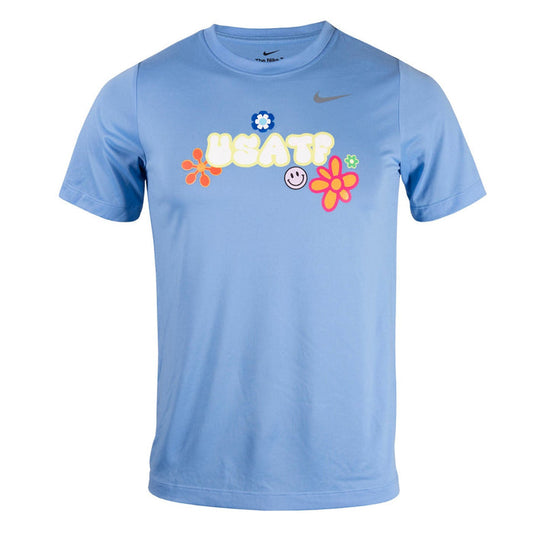 Light blue t-shirt with colorful graphics and a Nike logo on a white background