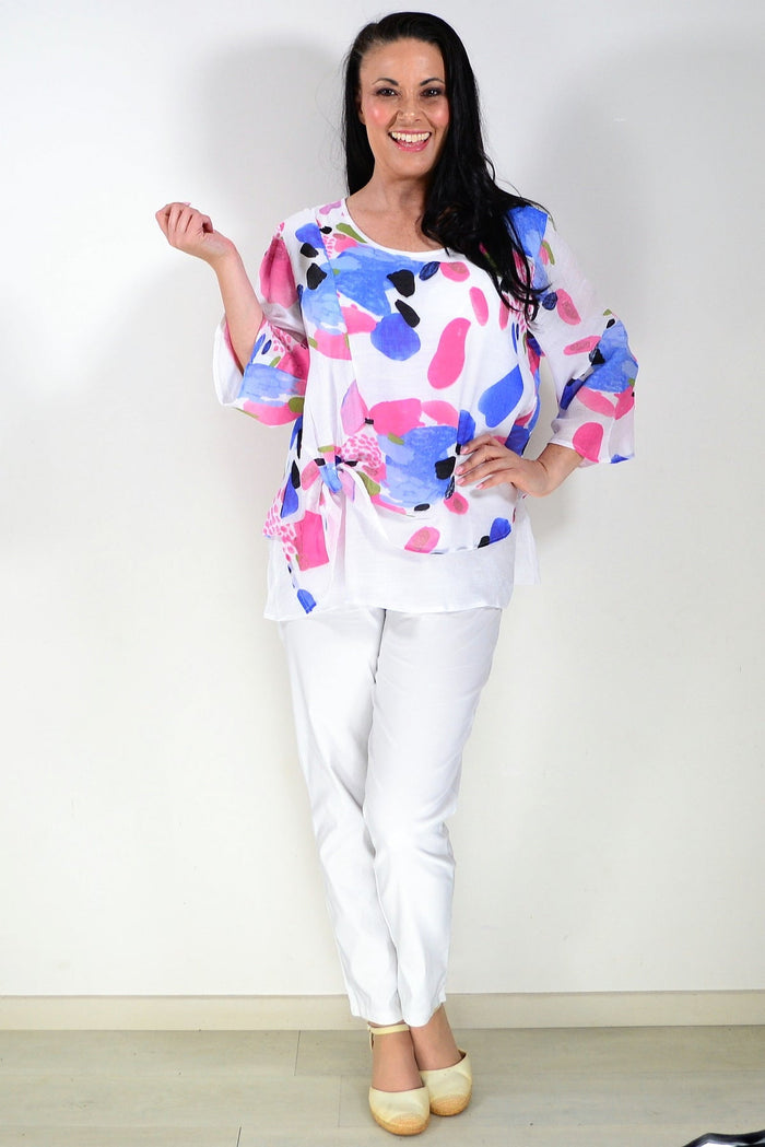 Pink and blue paint splash design tunic top by Wishstone, featuring a stylish and colorful casual wear look.