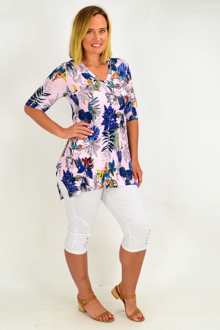 Pink tropical sleeveless tunic top by Whispers featuring a vibrant floral pattern and relaxed fit.