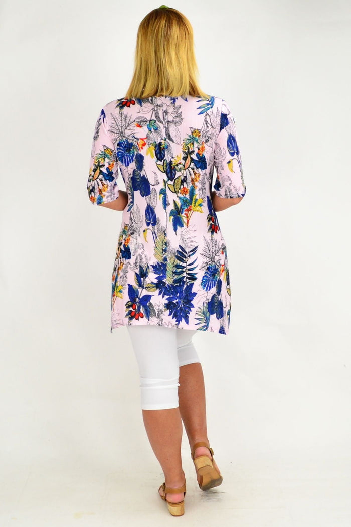 Pink tropical sleeveless tunic top by Whispers featuring vibrant floral patterns and a relaxed fit.