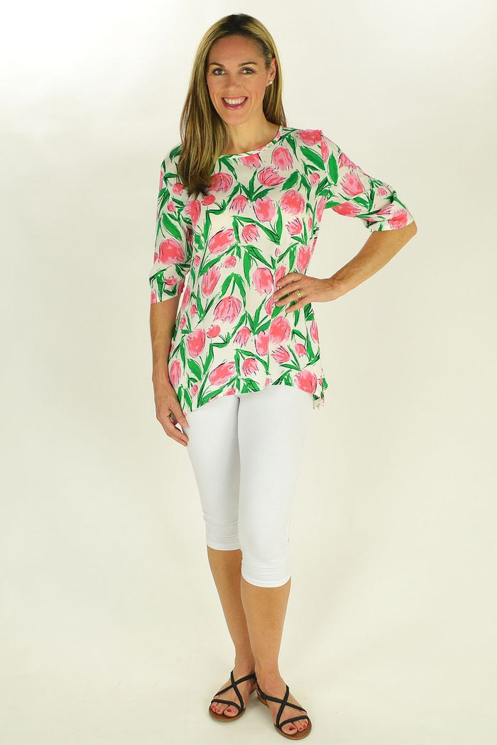 Pink Tulips Tunic by Sun Rose featuring a flowy fabric and floral tulip pattern, perfect for casual and spring outfits.