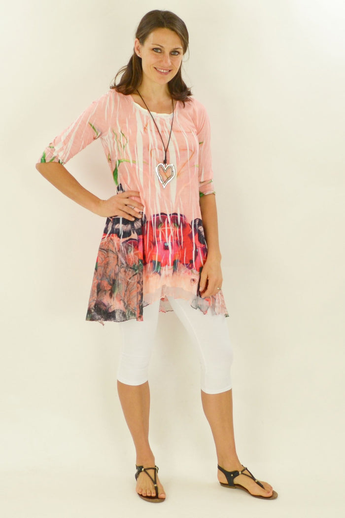 David Jessie Poppies and Butterflies Tunic featuring floral and butterfly print, displayed on a hanger against a neutral background.