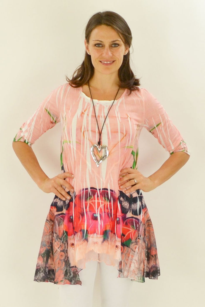 David Jessie Poppies and Butterflies Tunic featuring a colorful floral and butterfly pattern, displayed on a mannequin.