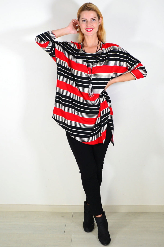 Red and black fleece tunic top by La Mode, featuring a comfortable, casual fit with long sleeves and a stylish design.