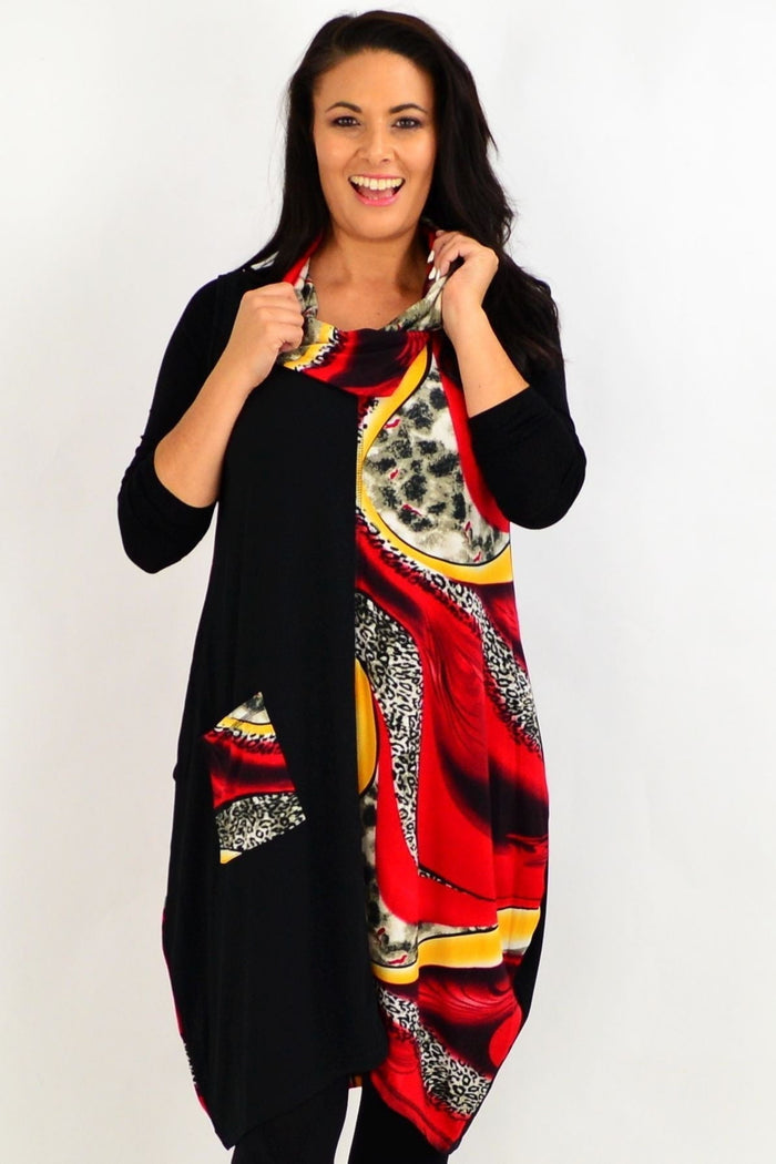 Red leopard print sleeveless tunic dress by Whispers, shown with a flowing fit and bold pattern on lightweight fabric.