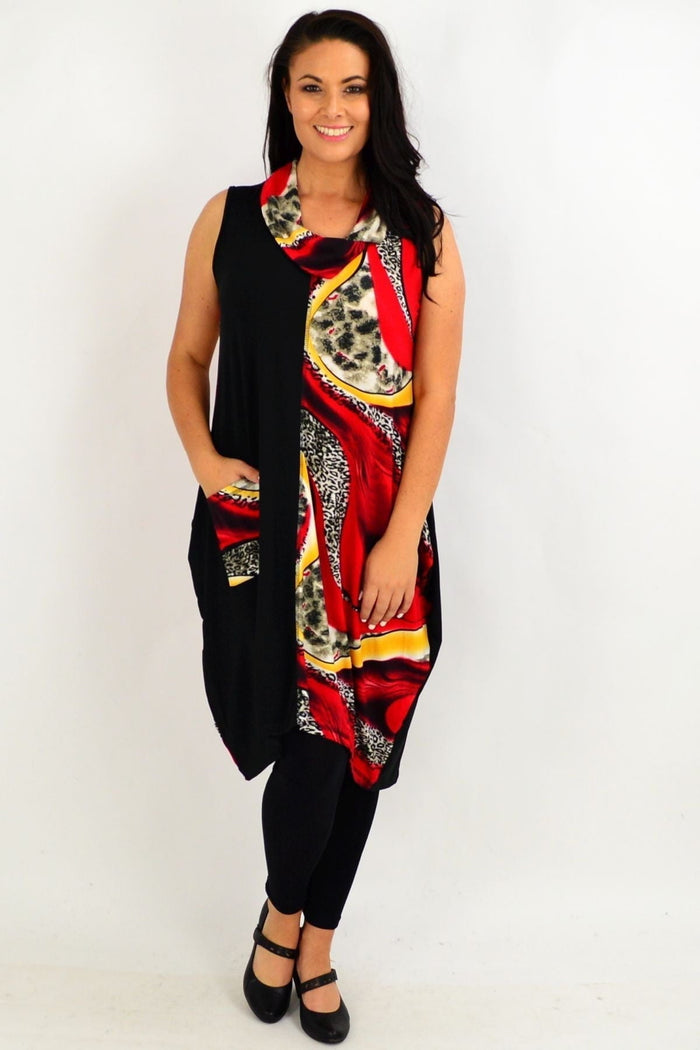 Red leopard print sleeveless tunic dress by Whispers, featuring a bold animal pattern and relaxed fit.