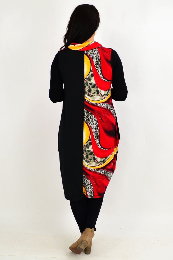 Red leopard print sleeveless tunic dress by Whispers, shown on a mannequin with a relaxed fit and bold animal pattern.