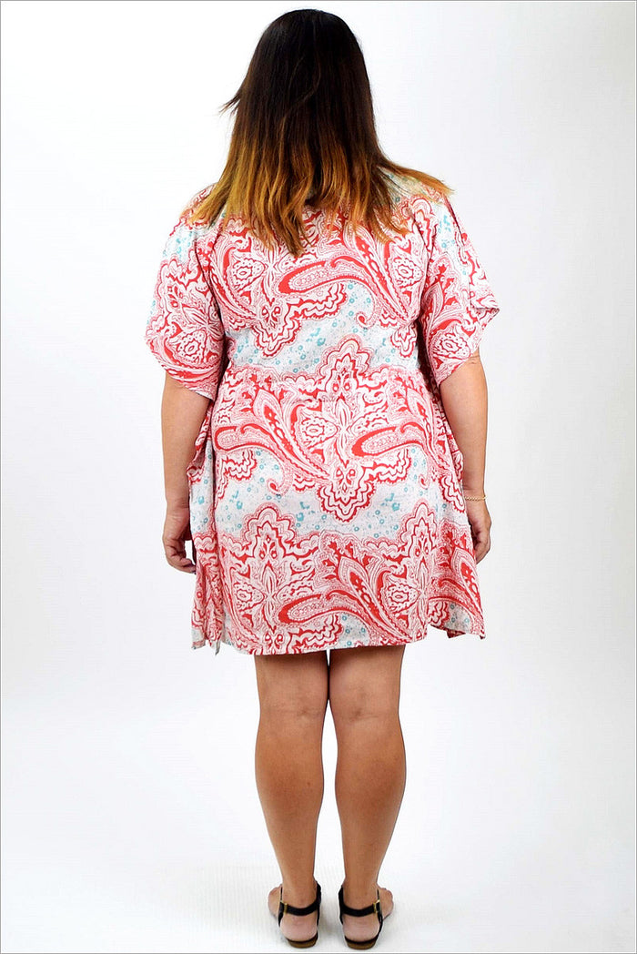 Red Mediterranean Kaftan tunic by Ethnic featuring flowing fabric and intricate patterns, perfect for casual or beachwear.