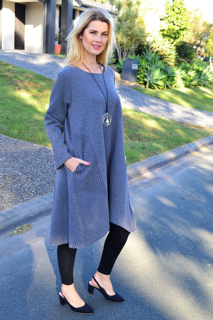 Relaxed grey textured peony tunic dress displayed on a hanger with a soft, flowing fabric and a casual fit.