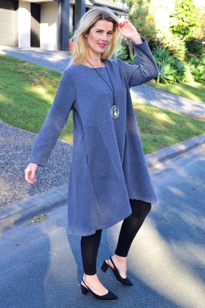 Grey textured Peony relaxed tunic dress with long sleeves and a loose fit, displayed on a hanger.