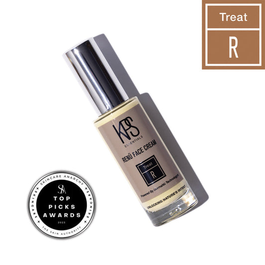 A bottle of Renū Face Cream | Kindness Powered Skincare with a silver cap, cast shadow, and a skincare award seal nearby, highlighting its recognition for quality and wellness benefits.