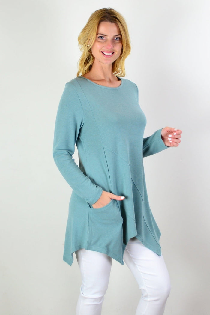 Sage green knit tunic top by Caroline Morgan featuring a relaxed fit and long sleeves, displayed on a mannequin.
