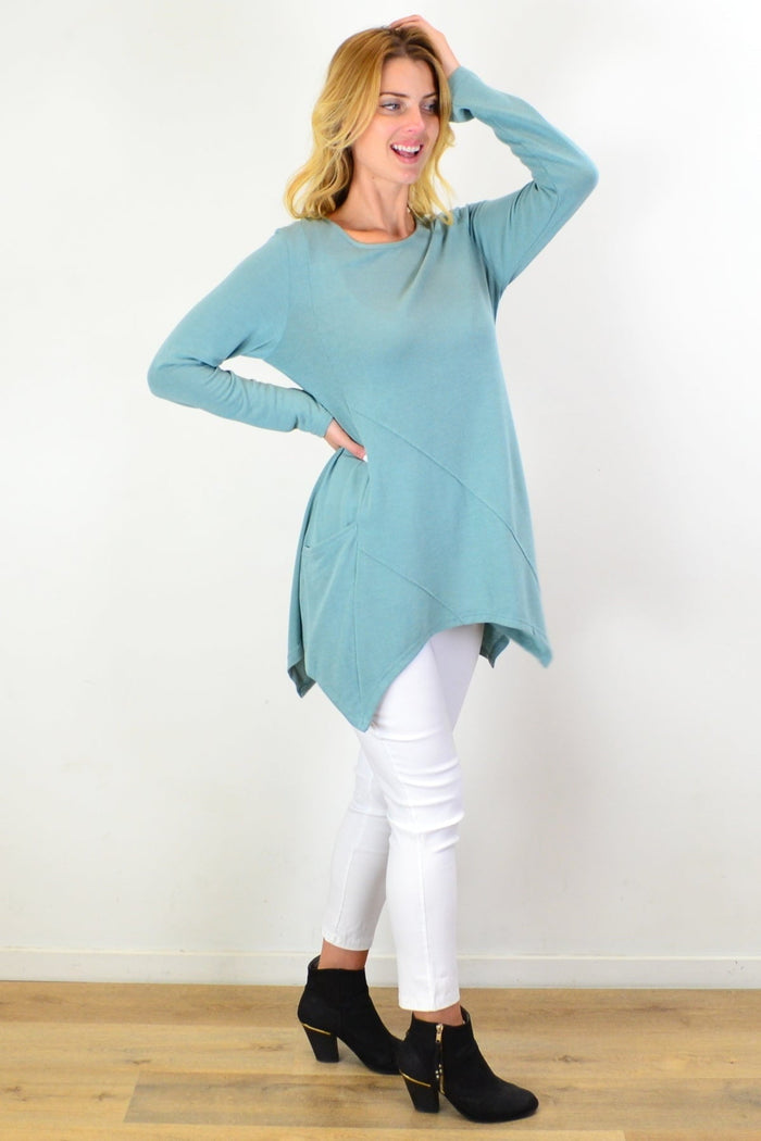 Sage green knit tunic top by Caroline Morgan featuring a relaxed fit and textured fabric, displayed on a neutral background.