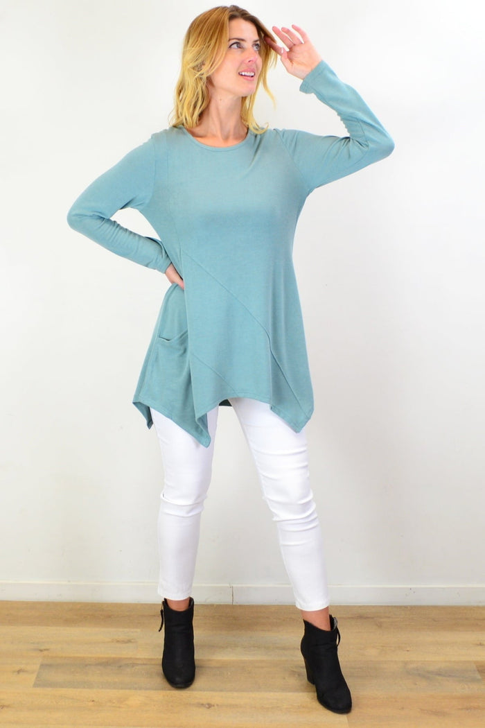 Sage green knit tunic top by Caroline Morgan, featuring a relaxed fit and textured fabric, displayed on a neutral background.