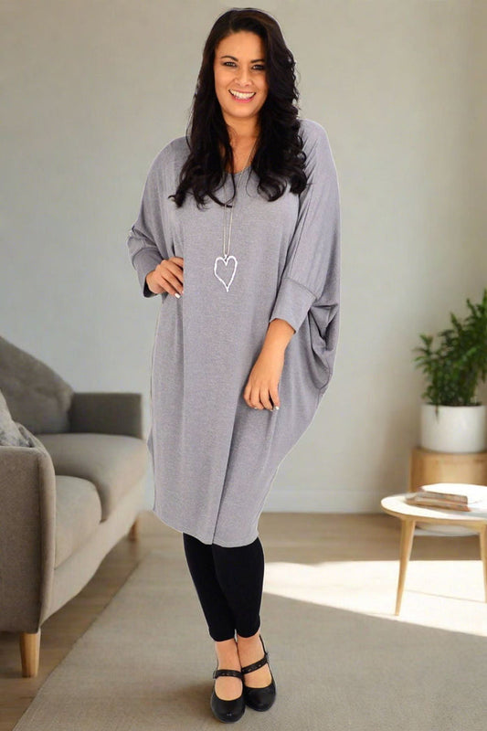 Silver grey oversized tunic dress by Lilia Whispers, featuring a relaxed fit and comfortable style, shown in a fabric close-up.