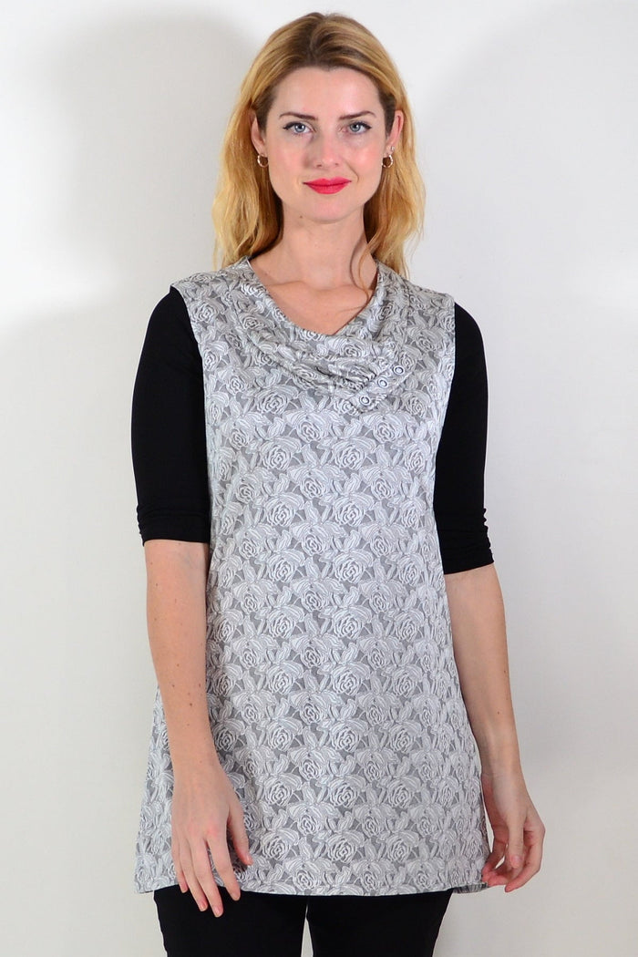 Silver rose sleeveless tunic top by Lilia, featuring a flowing fabric and relaxed fit, shown hanging on a display mannequin.