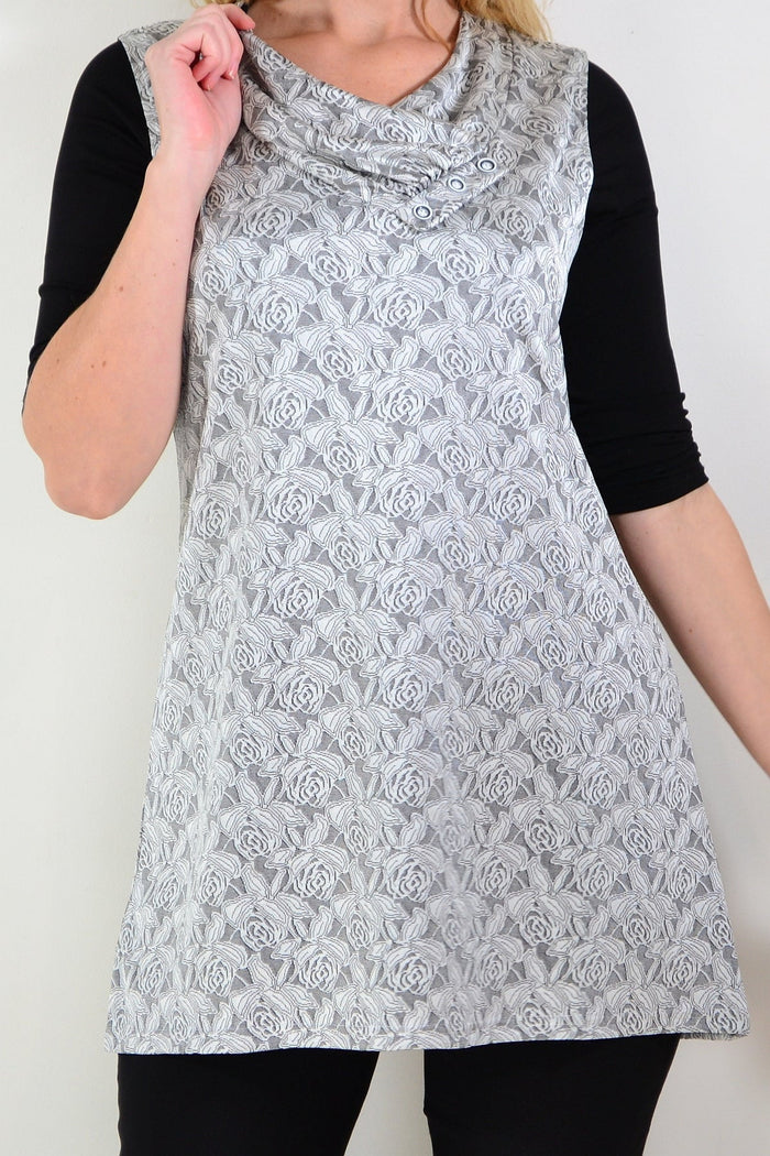 Silver sleeveless tunic top by Lilia with rose embellishments, featuring a flowing fit and elegant design.