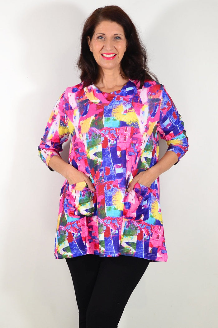 Wishstone Splash Of Colour tunic top with vibrant pattern, lightweight fabric, and relaxed fit, perfect for casual wear.