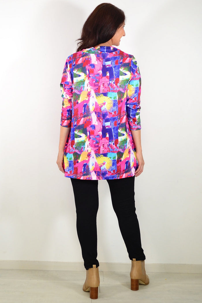 Wishstone splash of colour tunic top with vibrant pattern, lightweight fabric, and relaxed fit, perfect for casual or summer wear.