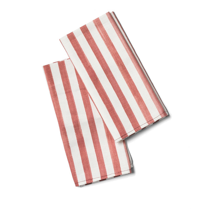 Two red and white striped napkins folded.