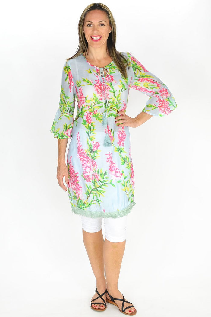 MSTYLE Summer Flowers Tunic featuring a vibrant floral pattern, lightweight fabric, and relaxed fit ideal for warm weather.
