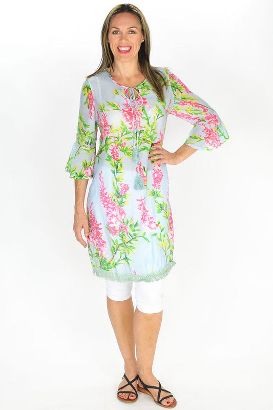 MSTYLE Summer Flowers Tunic featuring a vibrant floral pattern, lightweight fabric, and relaxed fit ideal for warm weather.
