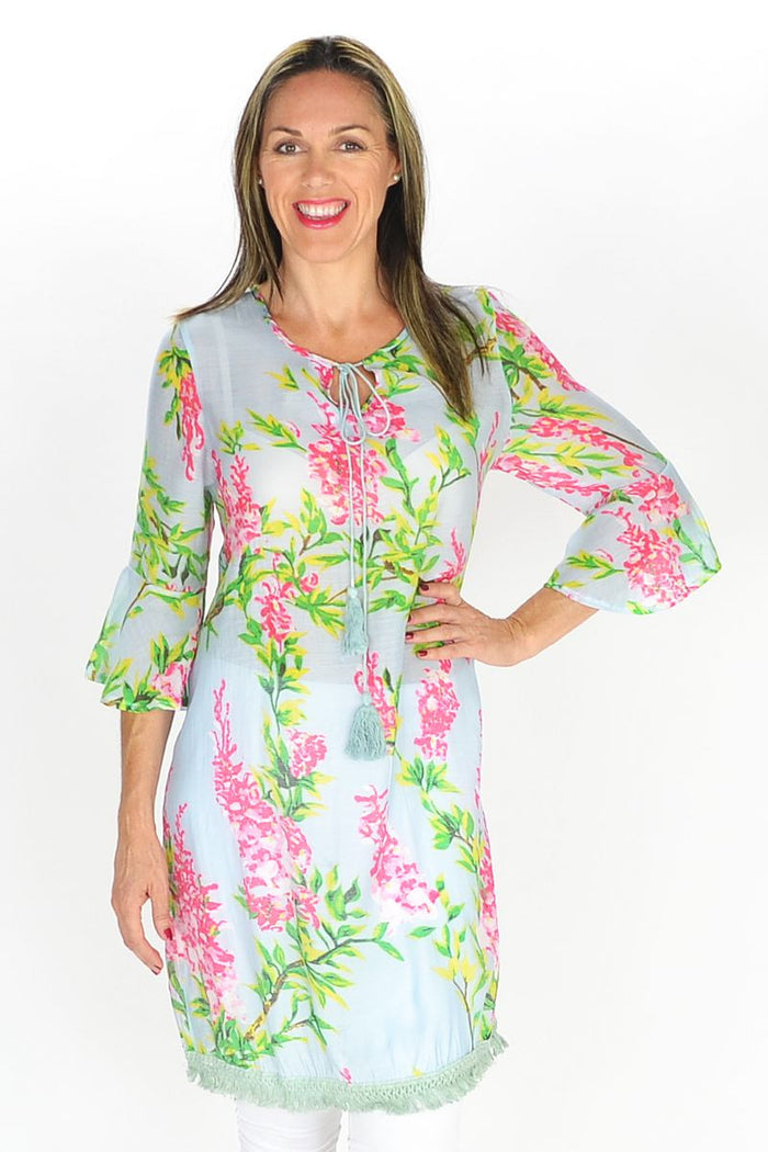 Colorful summer flowers printed MSTYLE tunic with short sleeves and relaxed fit, displayed on a hanger.