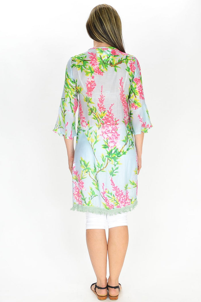 MSTYLE Summer Flowers Tunic with vibrant floral pattern, lightweight fabric, and relaxed fit, perfect for warm weather.