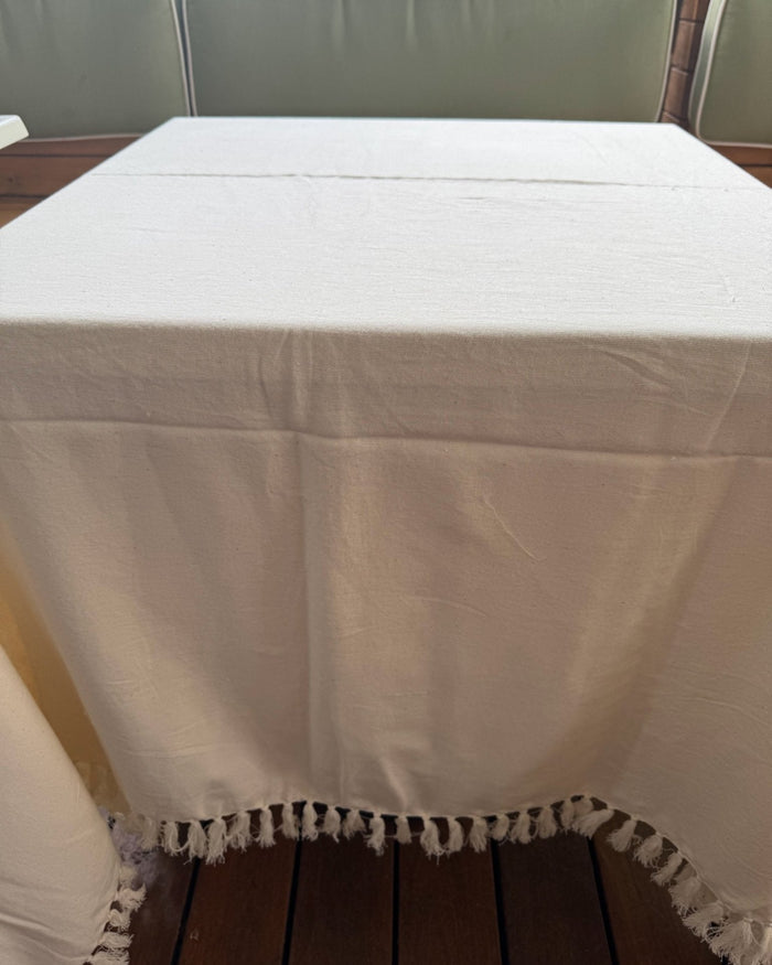 Tablecloth Cotton Square in Natural covering a square outside cafe table - ANNIE.G
