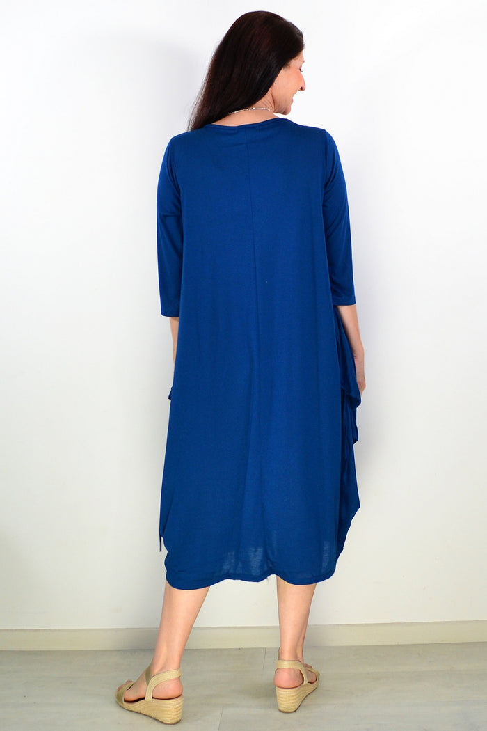 Lilia Whispers teal relaxed oversized tunic dress with long sleeves and a flowy fit, displayed on a white background.