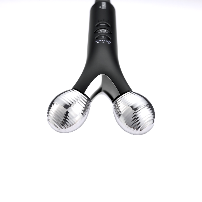 Black handheld massager with two silver massage balls on a white background