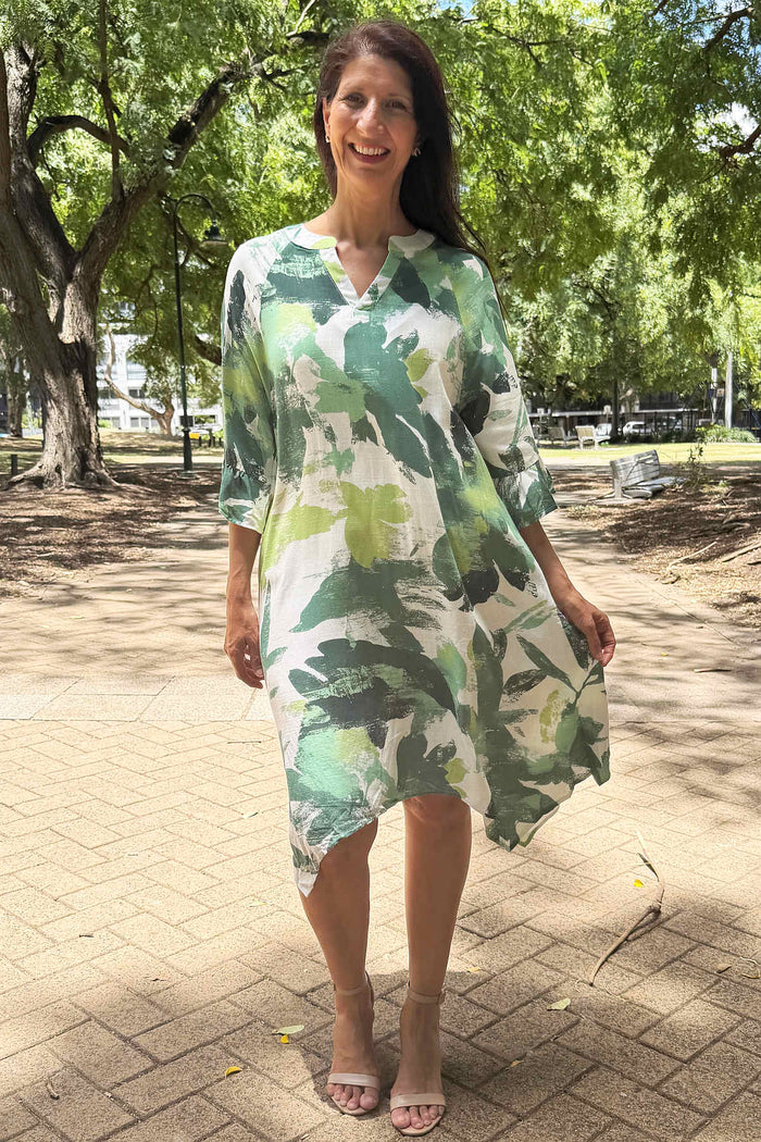 White and green paint splash tunic dress by Ruby Rain, featuring a flowy fabric and artistic design on a stylish tunic.