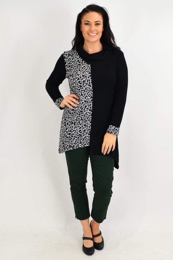 White Leopard Cuff Tunic Top by Whispers featuring animal print fabric and relaxed fit, shown on a model.