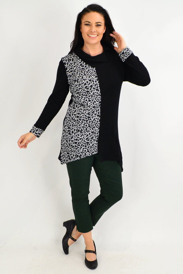 White leopard print cuff tunic top by Whispers, featuring animal print fabric and a relaxed fit, perfect for casual wear.