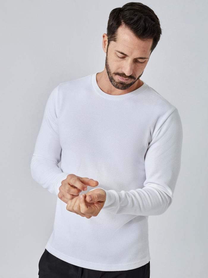 Patrick is 5'10", 163LBS and wears a size M # White Long Sleeve Thermal Crew Studio Image | Fresh Clean Threads