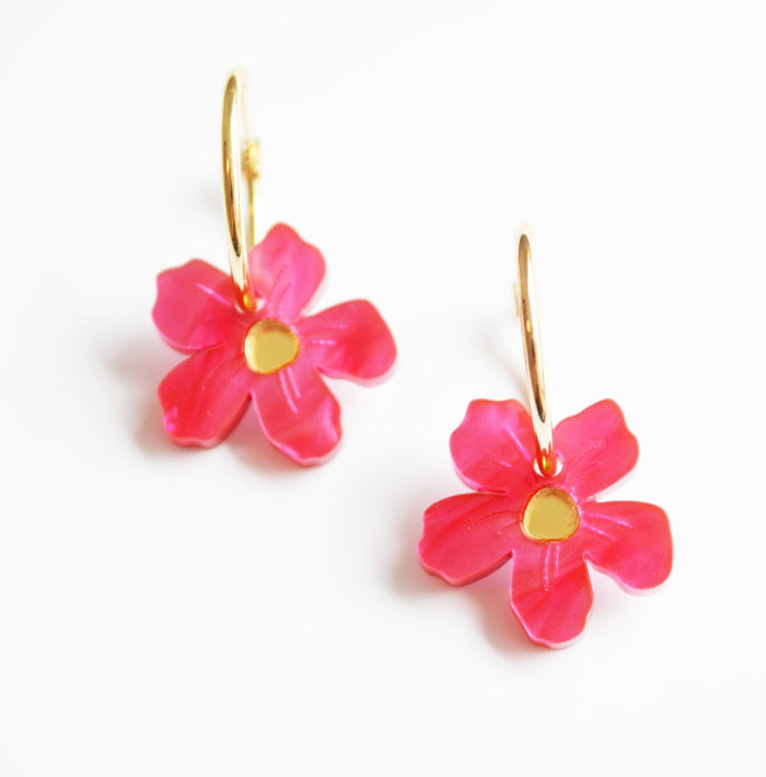 Vibrant pink flower drop earrings with mirror centre on a small gold hoop.