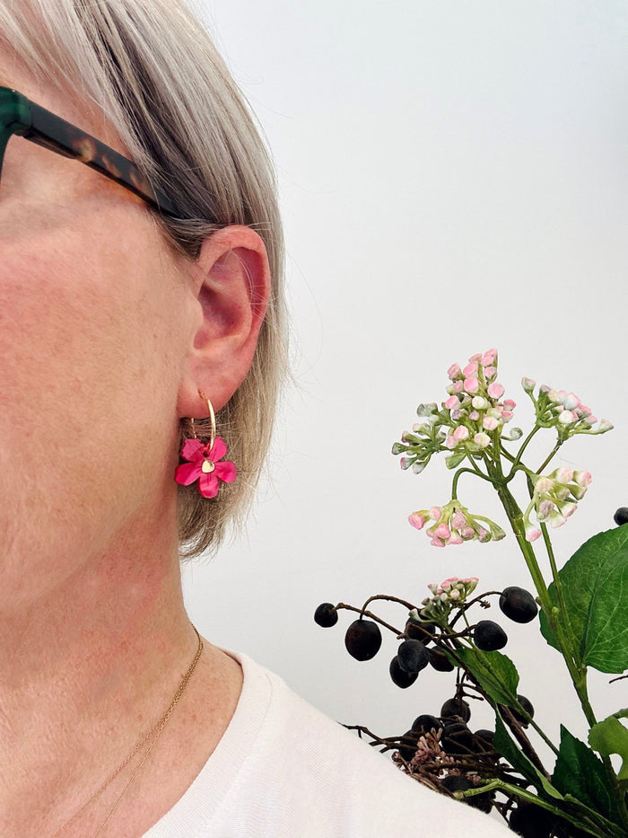 woman wearing fuchsia flower drop earrings - ANNIE.G