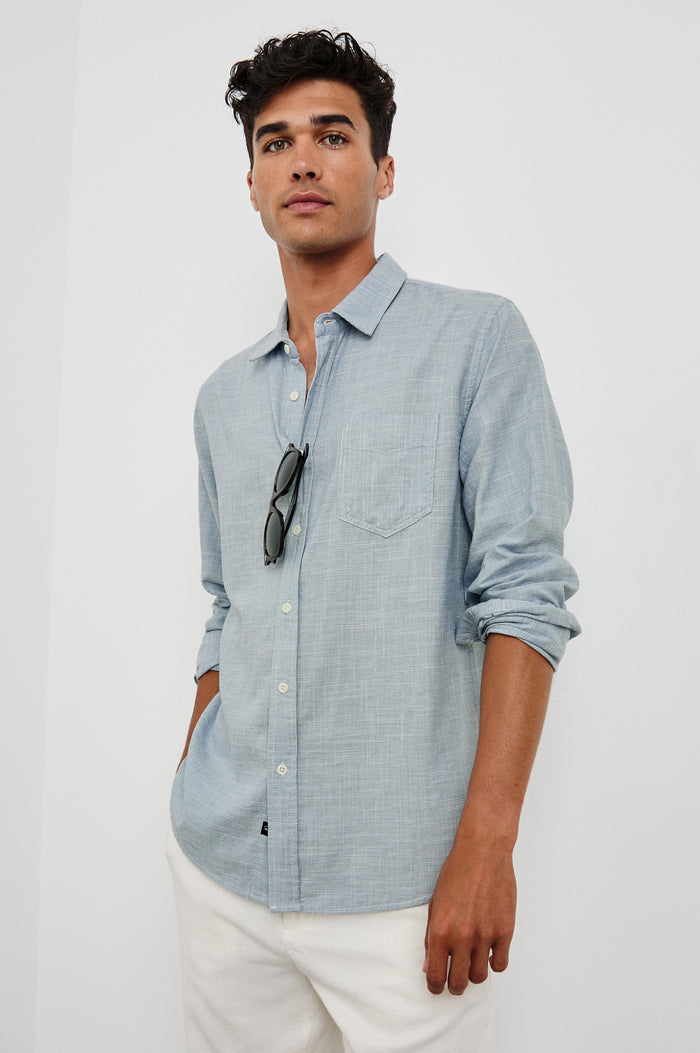 Wyatt Classic Button Up Long Sleeve Shirt in light blue Tidal Etch - Front view on Model with sleeves rolled up