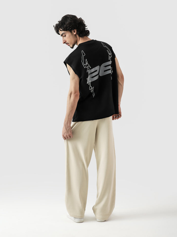 Young and Turnt Sando male model side view black graphic streetwear Pakistan – GROOVY